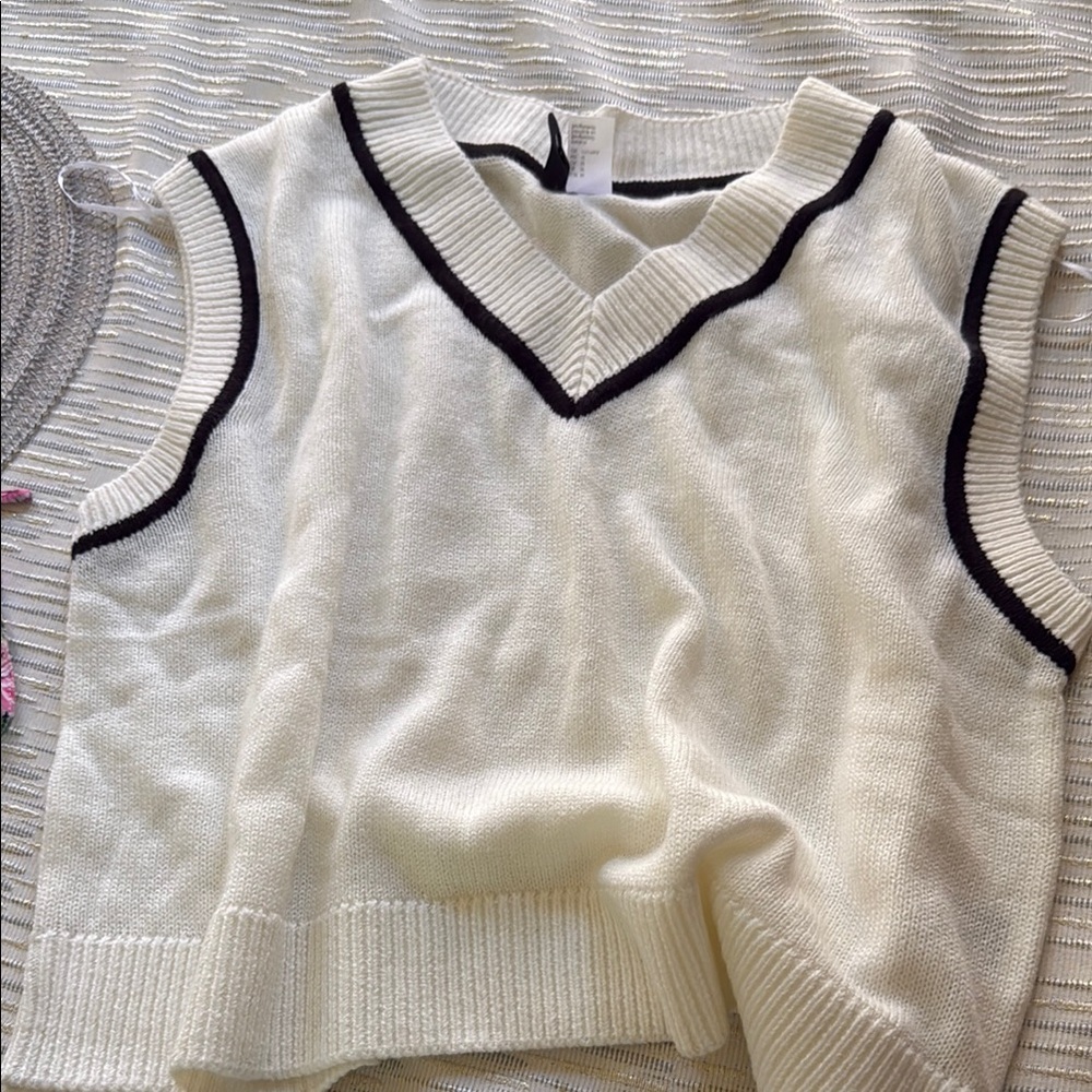 White Sleeveless V-Neck Sweater